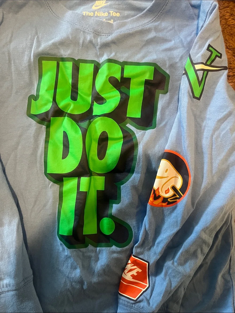 Nike Long-Sleeve Tee with Bright Green 'JUST DO IT.' Graphic on Light Blue